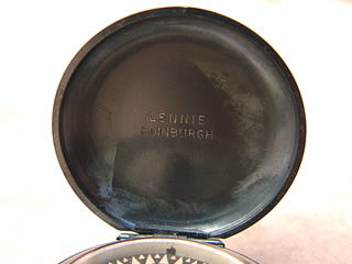 View of lid showing some loss of gunmetal finish